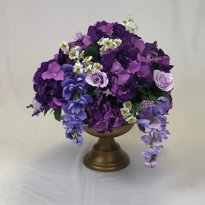 Purple flower arrangement for centrepiece