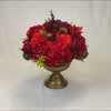 Red floral centrepiece for wedding reception