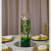 Cylinder with green leafs centrepiece